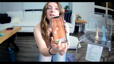 Webcam girl plays a sex dice game with her favorite dildo toys