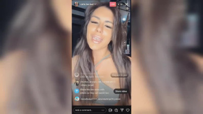 A hot milf tries on outfits and bares her big tits on a live broadcast on Instagram.