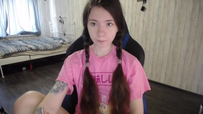 Pigtailed cutie toys with her pussy after a game session