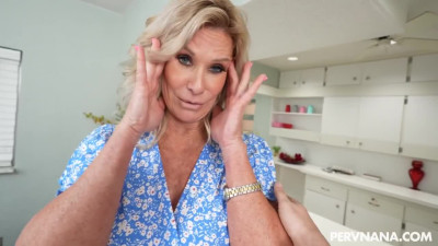 Fresh cum looks perfect on the freckled skin of a mature stepmother