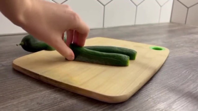 Cutie likes to use cucumber on her ass