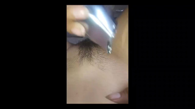 Pussy Trimming the beautiful Latina Pussy.