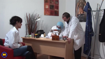 Mature woman is fucked and fisted by two kinky doctors
