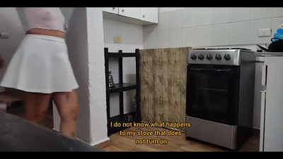 A curvy Latina called a neighbor to help her fix something in the kitchen