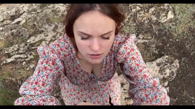 Redheaded GF does a beautiful blowjob outdoors
