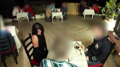 Men enjoy a delicious dinner in a restaurant, and Alexandra Wett enjoys their dicks under the table