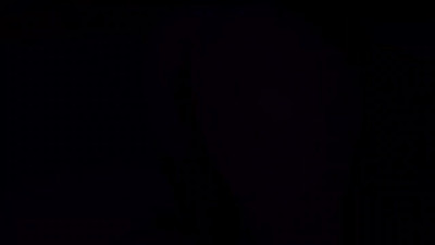 Sensual couple having sex in a neon room