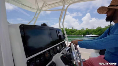 Slutty Valerica Steele gets a ride on the boat and blows a huge cock