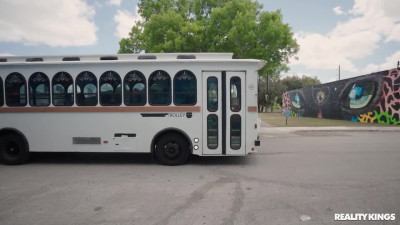Two lesbians share a huge black dick in the bus and take cumshots on faces