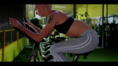 Anal workout on exercise bike with bald headed chick Lisa Fox