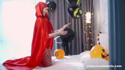 Cute brunette in devil costume masturbates pussy in different positions