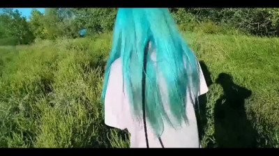 Teen with blue hair does blowjob outdoors