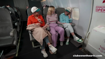 Lesbian threesome on a public plane