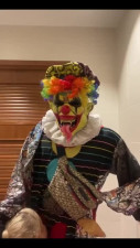 BBW MILF fucks with a creepy clown in a public restroom.