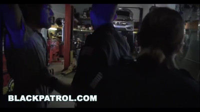Two horny police officers with big boobs take advantage of their position and have fun with the BBC Chop Shop owner .