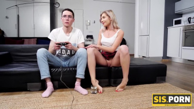 Slim blonde interrupts stepbro's game to suck his dick