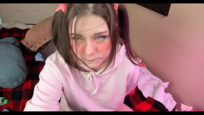 Cute girl sucks a huge dildo on camera