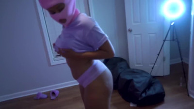 Chubby black broad dressed in pink taping her fuck session