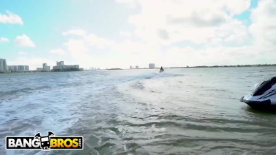 Latina babe goes for a ride on a jet ski with her butt naked