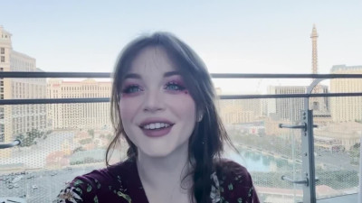 Naugty Emily Lynne filming how she fucks herself with a big toy on balcony