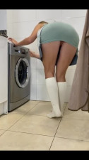 Young wife is cheating on her husband while doing laundry