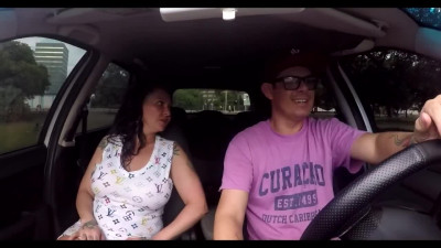 MILF with huge tits sucks driver's cock and fucks in doggy way