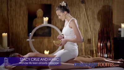 Stacy Cruz practices oily cock pleasing while massaging a muscular man
