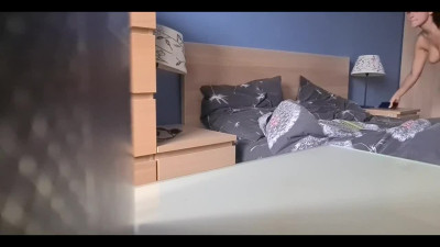 Solo girl watches porn and masturbates while a hidden camera films her