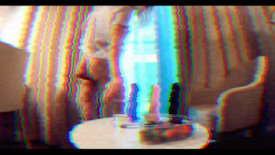 Sex-obsessed harlot jiggles her ass on a black dildo in a hotel room