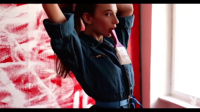 Beautiful model paints naked showing her perfect tits
