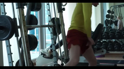 Pretty blonde babe fucked with trainer from behind