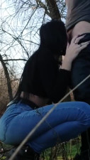 Brunette whore gives BJ to lucky guy in forest - public oral sex