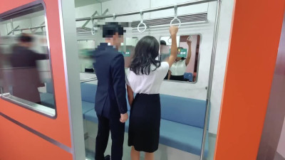 Amateur Japanese couple fucks in the train after work