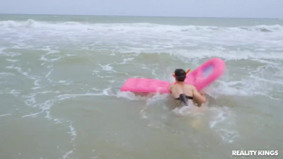 Sunny MILF is pussy attacked by a tricky boy on a public beach