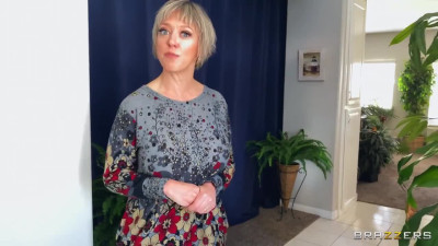 Mature blonde in stockings fucks herself with toys