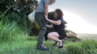 Japanese street whore is creamed by a stranger on a field
