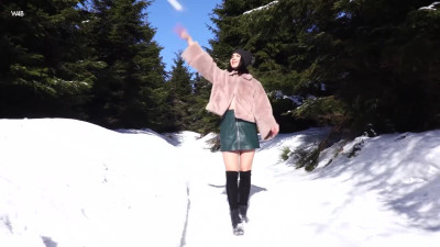 This brunette is so hot, the cold doesn't bother her at all