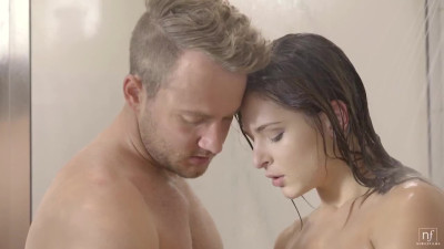 Natural brunette fucks with her lover in the shower