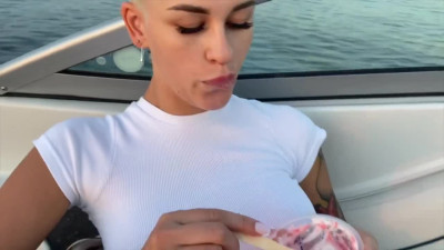 Bald tanned doll covers her body with ice cream before mouthing and drilling on a yacht pov