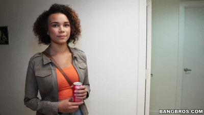 Curly ebony sucking stranger's black cock in bathroom