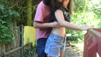 Teen brunette girlfriend makes standing sex with her lover in a public outdoor space