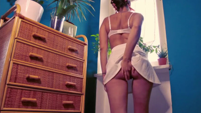 Italian MILF masturbating with dildo by the window