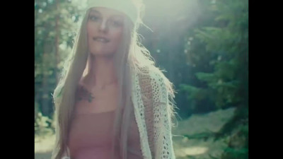 Slutty hippie plays with pussy and fucks with dildo in forest
