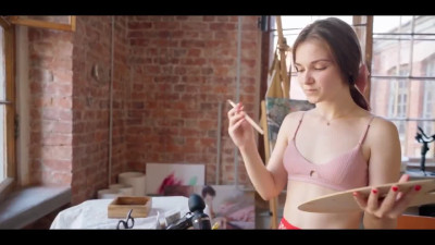 Teen in red cut fishnet pantyhose is masturbating with vibrator