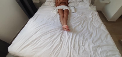 Busty babe with tan lines fucks on bed with phone