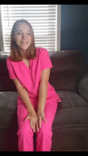 Milf nurse fingers her pussy in amateur solo