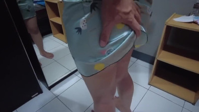 Asian housewife passionately welcomes her husband home from work