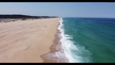 Big ass girl is riding bf's cock on a public beach
