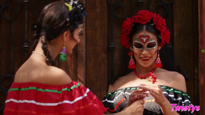 Two lesbians celebrate El Día de Muertos in their own sexy way