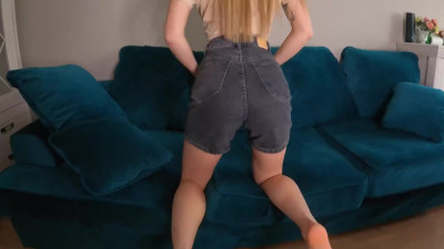 Babe try-on-haul pants with a violet butt plug in her ass